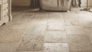 Modern bathroom flooring with light tile and wicker basket accent in Ottawa home